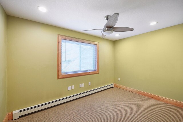1811 Lake Lucy Ln, Chanhassen, MN 55331 - unfurnished room featuring a baseboard heating unit, ceiling fan, baseboards, recessed lighting, and carpet flooring