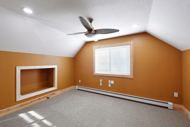 1811 Lake Lucy Ln, Chanhassen, MN 55331 - bonus room featuring baseboard heating, vaulted ceiling, carpet flooring, a ceiling fan, and a textured ceiling