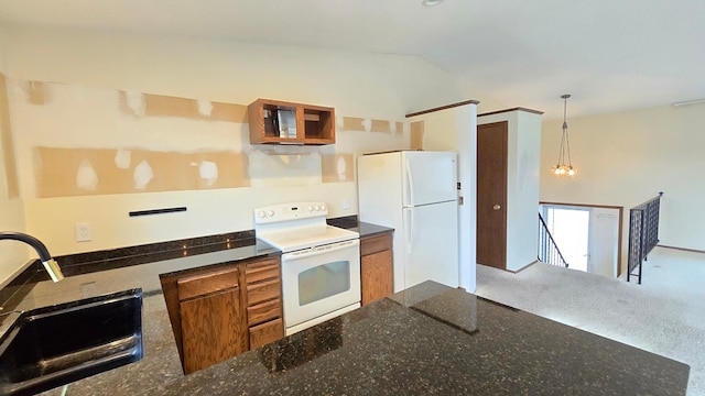 14291 92nd Ave N, Maple Grove, MN 55369 - kitchen featuring brown cabinetry, vaulted ceiling, a sink, dark stone counters, and white appliances