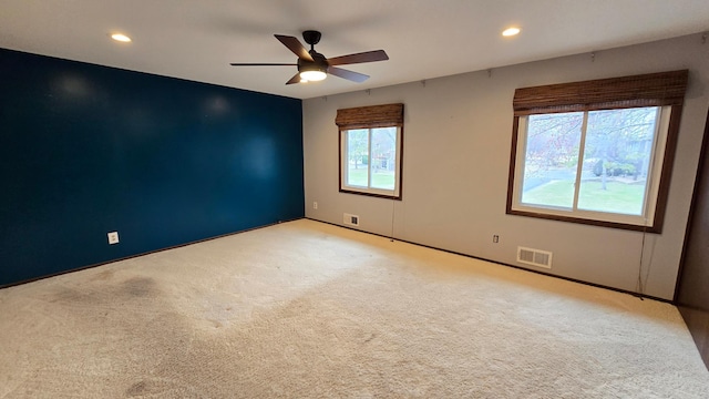 14291 92nd Ave N, Maple Grove, MN 55369 - empty room with ceiling fan, light colored carpet, recessed lighting, and visible vents