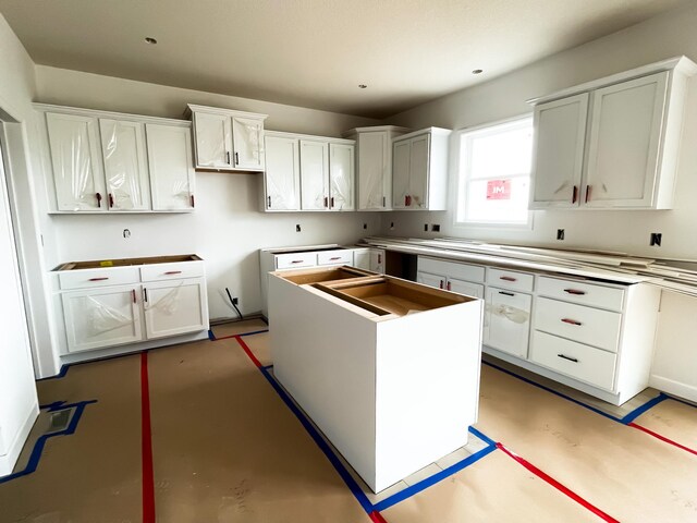 kitchen featuring white cabinetry and a kitchen island