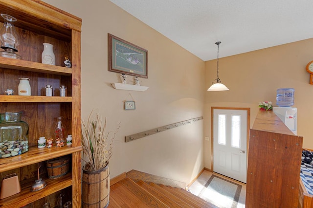 19023 Davis Ave, Faribault, MN 55021 - foyer entrance featuring wood finished floors and baseboards