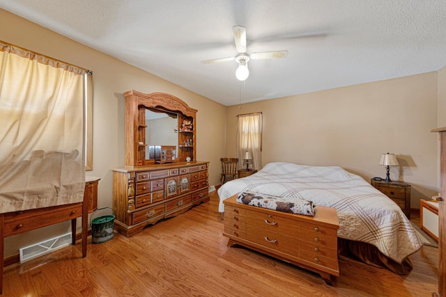 19023 Davis Ave, Faribault, MN 55021 - bedroom with ceiling fan, light wood-style flooring, and visible vents