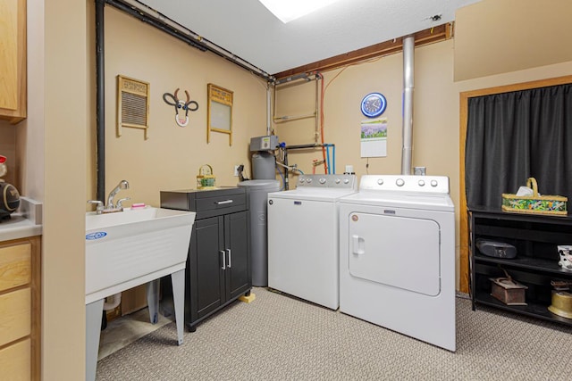 19023 Davis Ave, Faribault, MN 55021 - clothes washing area featuring cabinet space and washing machine and dryer