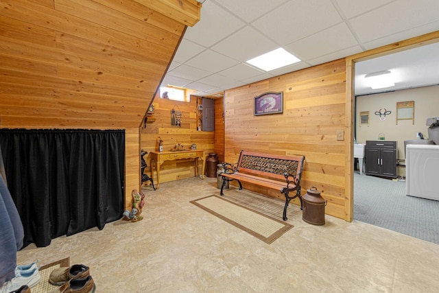 19023 Davis Ave, Faribault, MN 55021 - sitting room with a drop ceiling, wood walls, and carpet