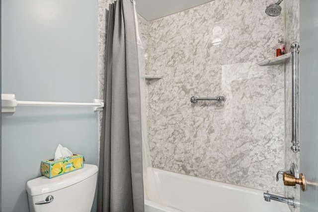 2495 Canabury Dr Unit 220, Little Canada, MN 55117 - bathroom featuring shower / bath combo with shower curtain and toilet