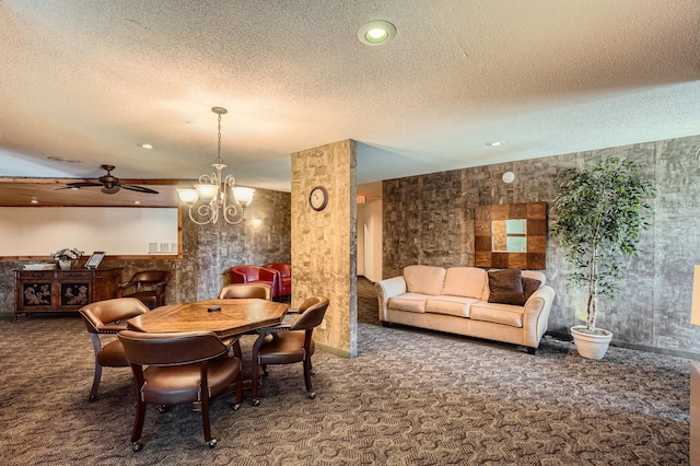 2495 Canabury Dr Unit 220, Little Canada, MN 55117 - dining room with visible vents, carpet flooring, a textured ceiling, and ceiling fan with notable chandelier