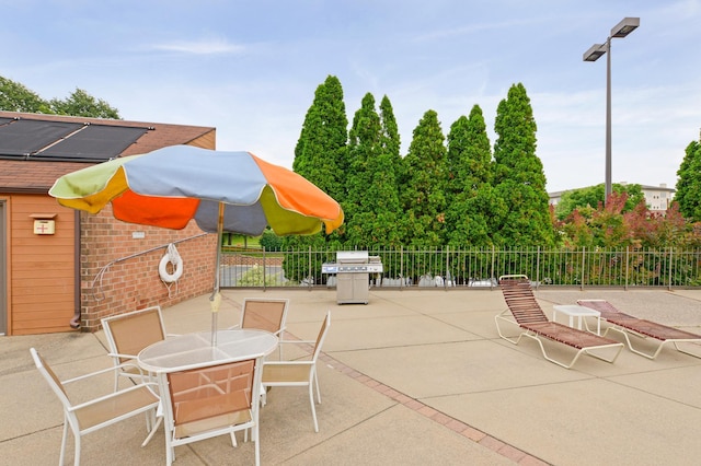 3300 Louisiana Ave S Unit 523, Saint Louis Park, MN 55426 - view of patio with outdoor dining space and grilling area