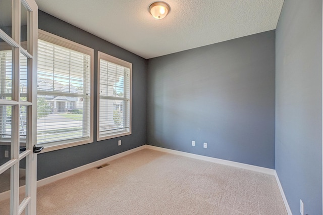 4764 Ashton Curv, Woodbury, MN 55129 - carpeted empty room with baseboards and a textured ceiling