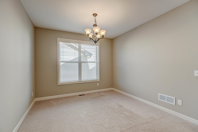 4764 Ashton Curv, Woodbury, MN 55129 - carpeted spare room featuring a chandelier and baseboards