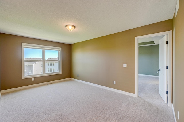 4764 Ashton Curv, Woodbury, MN 55129 - unfurnished room with light carpet and a textured ceiling