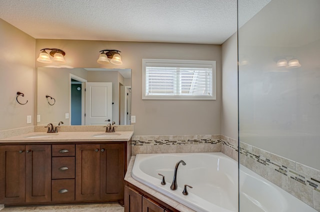 4764 Ashton Curv, Woodbury, MN 55129 - bathroom featuring double vanity, a garden tub, and a textured ceiling