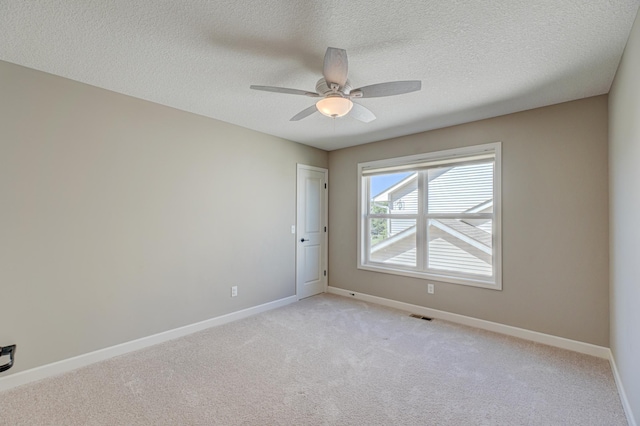 4764 Ashton Curv, Woodbury, MN 55129 - empty room with a ceiling fan, light carpet, and a textured ceiling