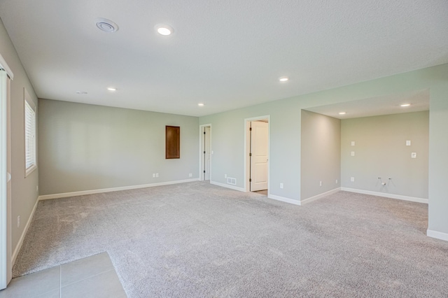 4764 Ashton Curv, Woodbury, MN 55129 - unfurnished room with light carpet and recessed lighting