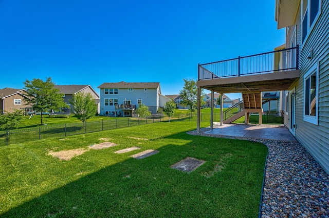 4764 Ashton Curv, Woodbury, MN 55129 - fenced backyard with a patio area, stairs, a deck, and a residential view