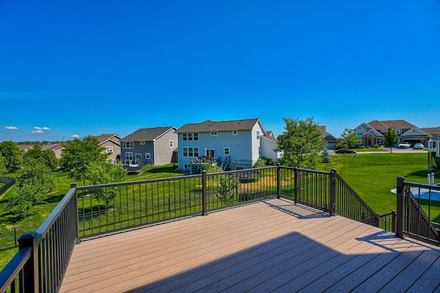 4764 Ashton Curv, Woodbury, MN 55129 - wooden deck featuring a residential view and a yard
