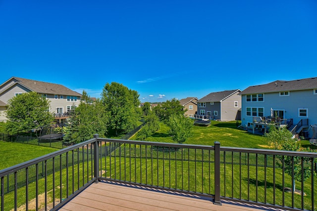 4764 Ashton Curv, Woodbury, MN 55129 - wooden deck featuring a residential view and a lawn