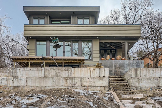 view of front of home with stairway