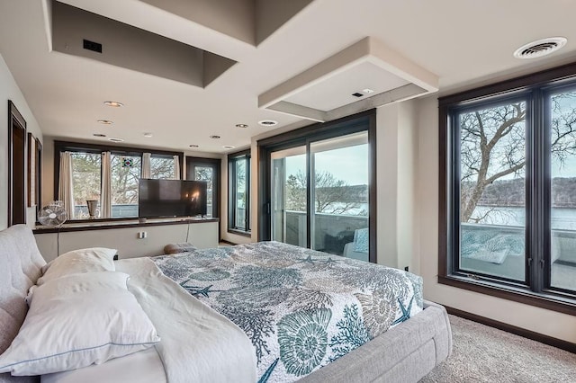 bedroom featuring visible vents, access to exterior, and baseboards