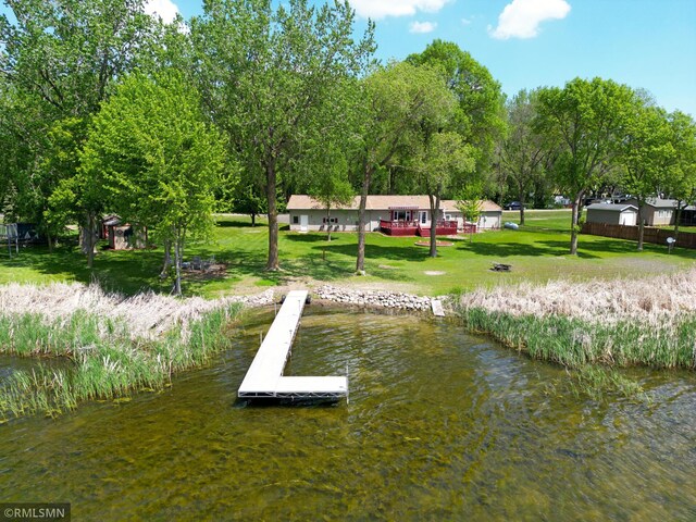 36683 657th Ave, Watkins, MN 55389 - dock with a water view and a lawn