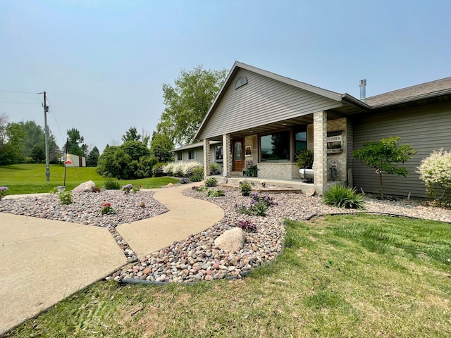32337 Juniper Rd, Chatfield, MN 55923 - view of green lawn featuring a porch