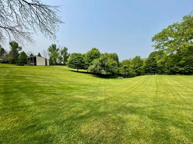32337 Juniper Rd, Chatfield, MN 55923 - view of green lawn with an outbuilding