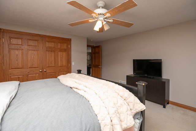 32337 Juniper Rd, Chatfield, MN 55923 - bedroom featuring light colored carpet, ceiling fan, and baseboards