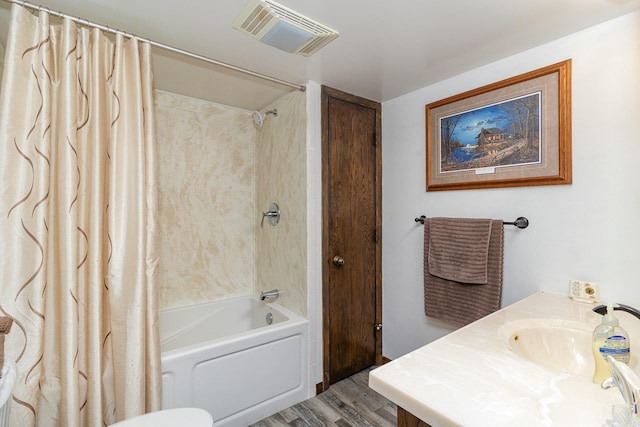 6200 37th St W, Webster, MN 55088 - bathroom featuring wood finished floors, shower / bath combination with curtain, and a sink