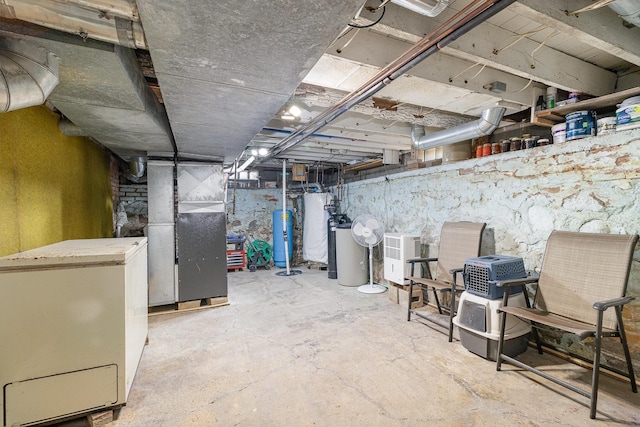 6200 37th St W, Webster, MN 55088 - unfinished basement featuring refrigerator, heating unit, and water heater