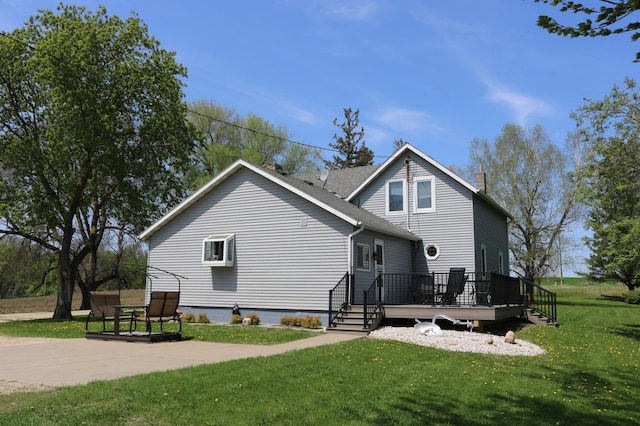 6200 37th St W, Webster, MN 55088 - rear view of house featuring a lawn and a deck