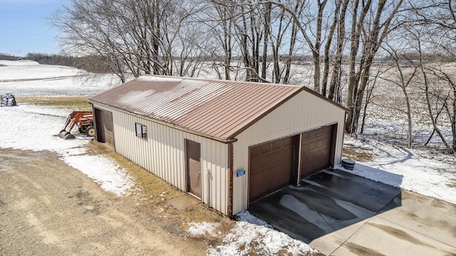 6200 37th St W, Webster, MN 55088 - snow covered garage featuring a detached garage