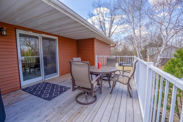 122 Ridge Rd, New London, MN 56273 - deck with outdoor dining space