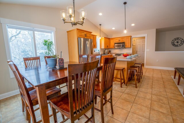 122 Ridge Rd, New London, MN 56273 - dining room with baseboards, lofted ceiling, recessed lighting, light tile patterned floors, and a chandelier