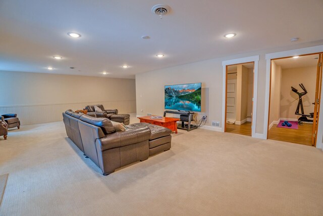 122 Ridge Rd, New London, MN 56273 - living area featuring carpet floors, recessed lighting, and wainscoting
