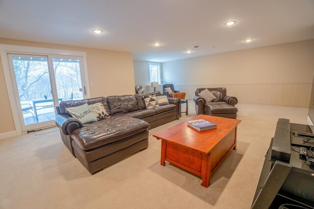 122 Ridge Rd, New London, MN 56273 - carpeted living area featuring recessed lighting and a wainscoted wall