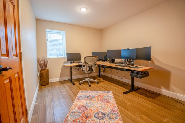 122 Ridge Rd, New London, MN 56273 - office space featuring wood finished floors, baseboards, and recessed lighting