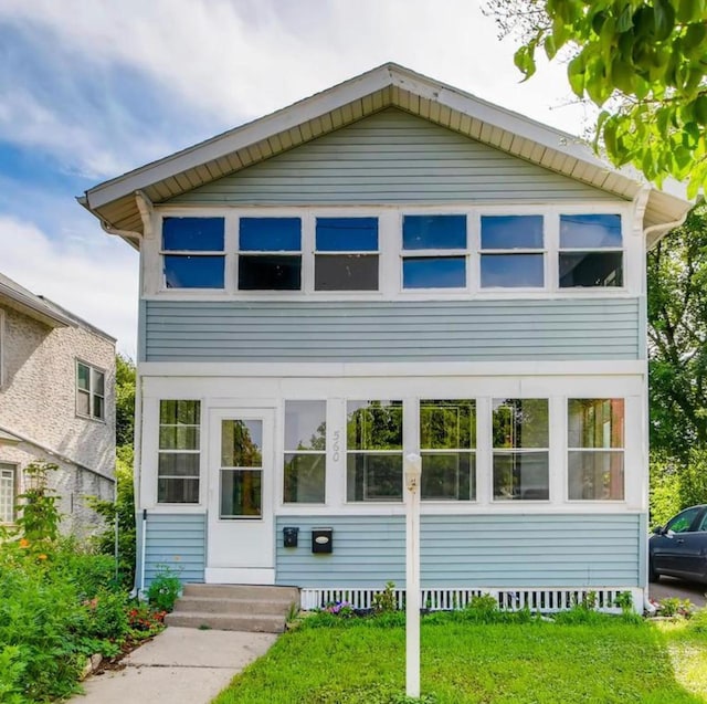 560 Stryker Ave, Saint Paul, MN 55107 - view of front of house with entry steps and crawl space