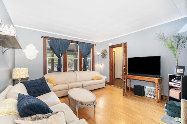 560 Stryker Ave, Saint Paul, MN 55107 - living area with crown molding and light wood-type flooring