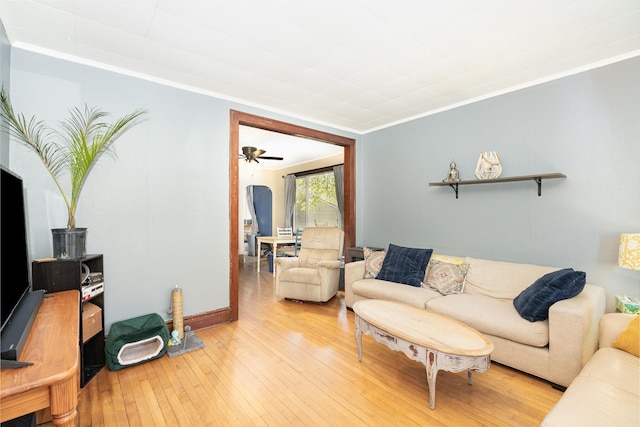 560 Stryker Ave, Saint Paul, MN 55107 - living area featuring baseboards, ceiling fan, crown molding, and light wood-type flooring