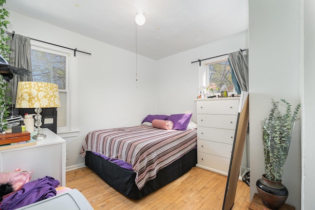 560 Stryker Ave, Saint Paul, MN 55107 - bedroom with baseboards and wood-type flooring