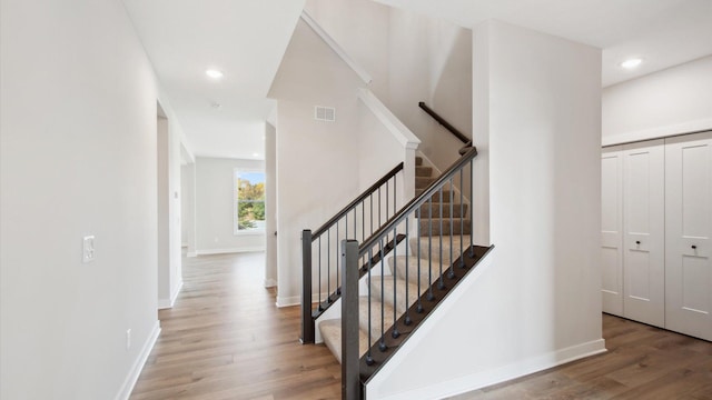 11746 35th St N, Lake Elmo, MN 55042 - stairs with wood finished floors, recessed lighting, and baseboards