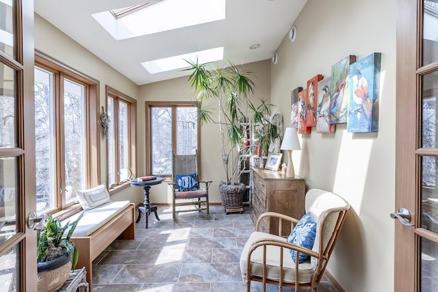 30 Interlachen Ln, Tonka Bay, MN 55331 - sunroom / solarium featuring a skylight, stone finish flooring, and lofted ceiling