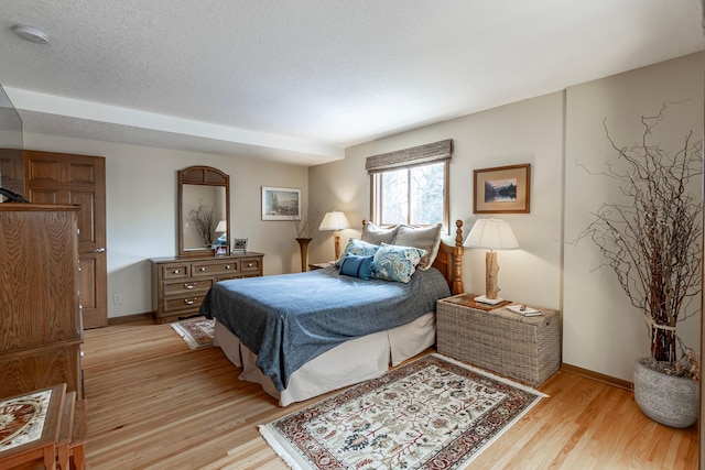 30 Interlachen Ln, Tonka Bay, MN 55331 - bedroom with light wood finished floors and baseboards