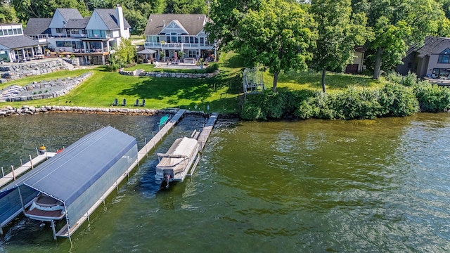 30 Interlachen Ln, Tonka Bay, MN 55331 - dock featuring a water view, a yard, and boat lift