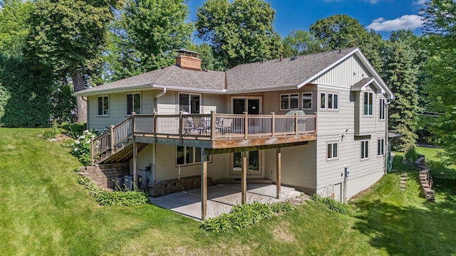 30 Interlachen Ln, Tonka Bay, MN 55331 - rear view of property featuring a patio area, a shingled roof, a lawn, a chimney, and a deck