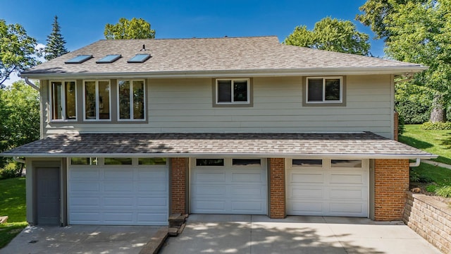 30 Interlachen Ln, Tonka Bay, MN 55331 - garage featuring driveway