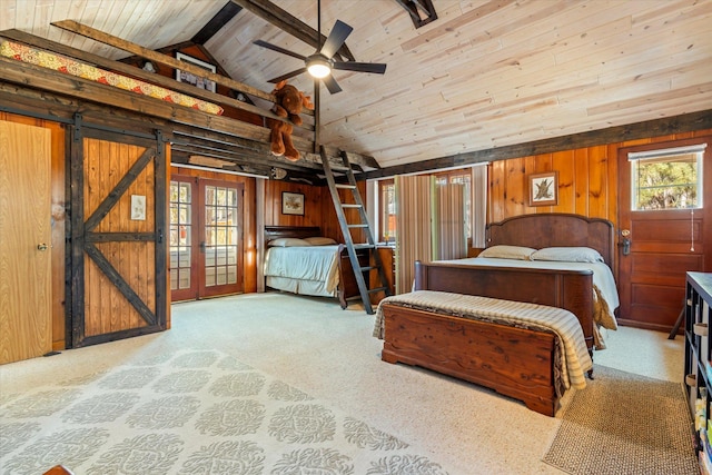 carpeted bedroom featuring wooden walls, wood ceiling, beam ceiling, high vaulted ceiling, and french doors
