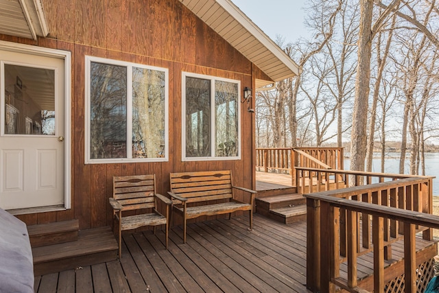 48987 Tamarac Dr, Scambler Twp, MN 56572 - wooden terrace featuring a water view