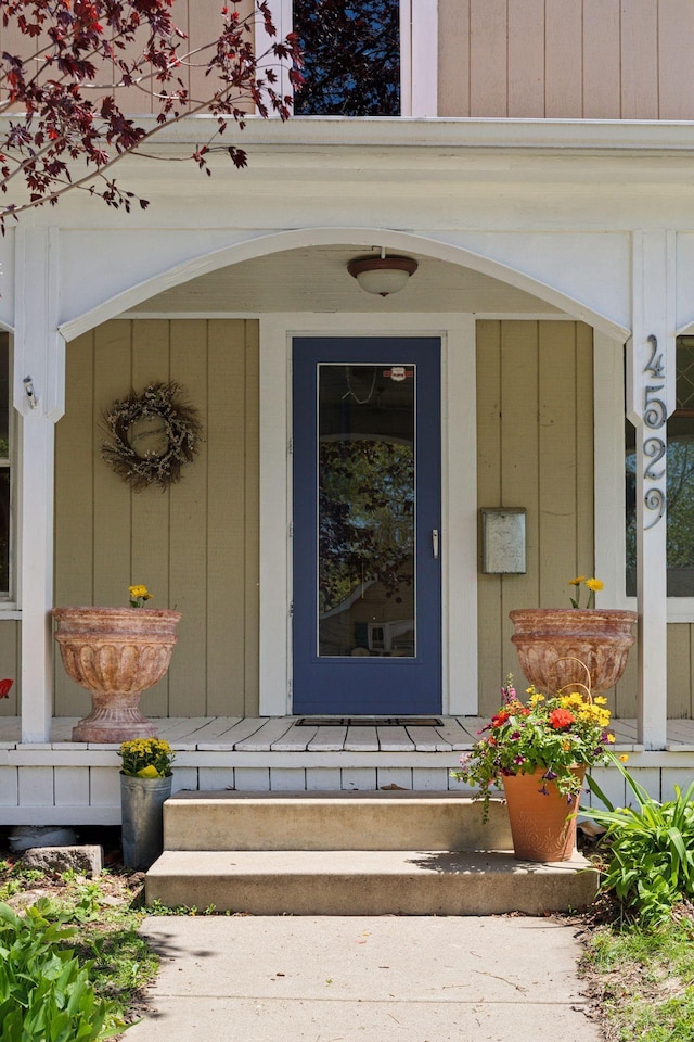 entrance to property with covered porch