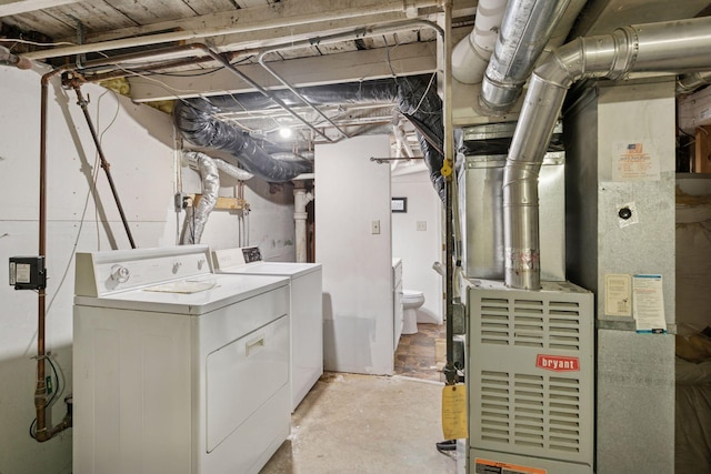 unfinished below grade area with washer and dryer and heating unit